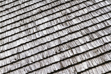 Closeup.  Background. Dark wood texture. Traditional rustic wooden roof from Poland