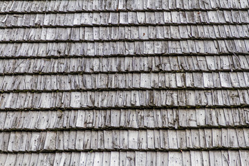 Closeup.  Background. Dark wood texture. Traditional rustic wooden roof from Poland