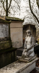 statue in cemetery of paris