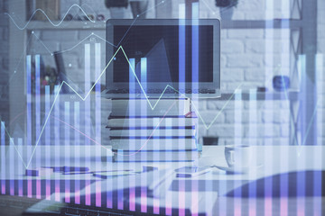 Stock market chart hologram drawn on personal computer background. Multi exposure. Concept of investment.