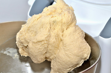 Mixing Pizza raw dough in multifunction machine