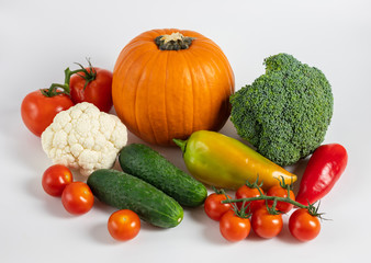 Healthy food concept. Vegetables on white background. Banner. Pumpkin, tomatoes, cucumbers, peppers, cauliflower and broccoli.