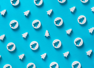 Merry Christmas background happy new year tree pattern on blue pastel table