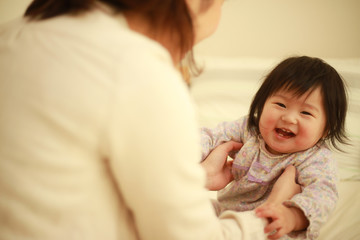 Fototapeta na wymiar 笑顔の赤ちゃん