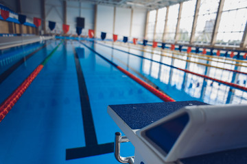 Swimming pool without people. Sunny day at the pool