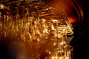 glasses hanging on the bar