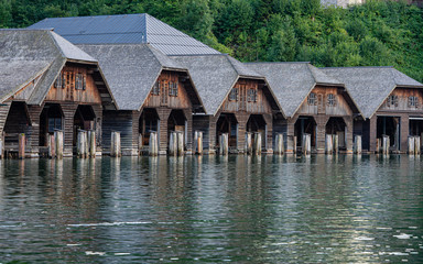 Fototapeta na wymiar Boathouse on the Koenigsee lake in Bavaria Alps. Germany.