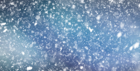 Fototapeta premium snowflakes on dark sky. Winter background