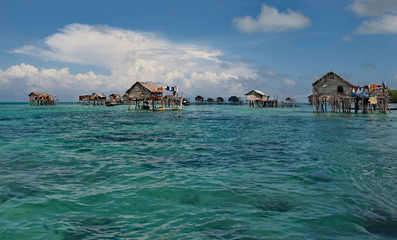 Malaysia. A Gypsy fishing village on one of the many islets on the East coast of Borneo.
