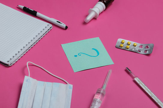 Medical Still Life On Pink Studio Background. Top View.