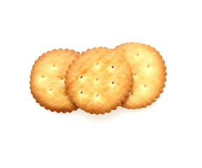 Round cheese crackers with salt isolated on white background.