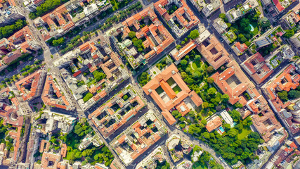 Fototapeta premium Milan, Italy. Roofs of the city aerial view. Cloudy weather, Aerial View, HEAD OVER SHOT