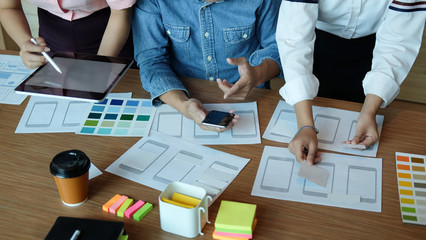 UX UI concept, Team of Website designer Creative planning application development draft sketch...