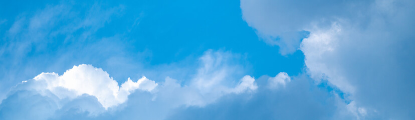 blue sky with clouds using as background cover page concept.