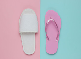 Slippers and flip-flops on colored paper background. Minimalistic fashion concept. Top view