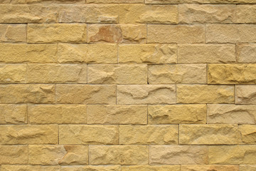 Sandstone yellow wall texture for background.
