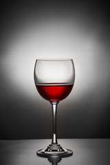 Wine in a glass on a black and white background