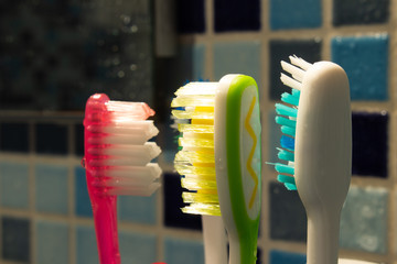 some colorful family toothbrushes