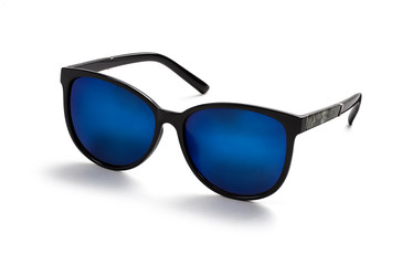 Stylish women's sunglasses with blue lenses on a white background. View in half a turn.
