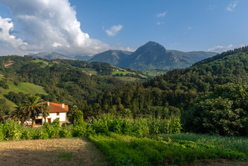 Panorama of Goierri from Baliarrain village with Txindoki mountain as background, Basque Country, Spain