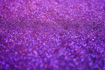 A stunning Christmas background, a Christmas background with magic sparkles and glowing powder of different colors, decorations for a higher event for the New Year and Christmas, a cozy home atmospher