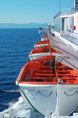 Lifeboats on cruiser