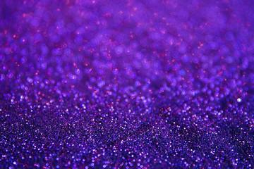 A stunning Christmas background, a Christmas background with magic sparkles and glowing powder of different colors, decorations for a higher event for the New Year and Christmas, a cozy home atmospher