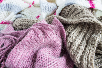 Warm knitted scarves in different colors