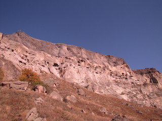 Fototapeta na wymiar View on the Vardzia Cavetown from Below in Vardzia, Georgia