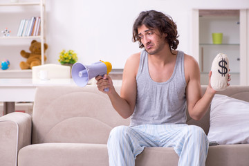 Unemployed man desperate at home
