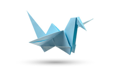 Origami flying bird isolated with clipping path. Japanese folded paper swan