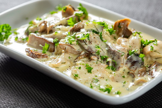 Chicken meat with mushrooms and cream