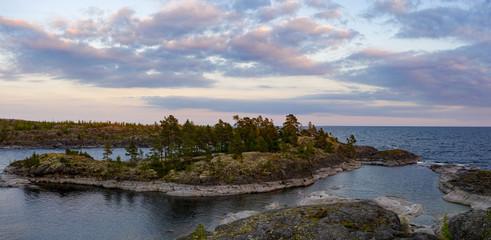 Panorama Of Karelia. Russia. lake Ladoga. Rocky Islands in lake Ladoga. Ladoga skerries under the clouds. Nature of Russia. Northern nature. Landscape Of Karelia. Travel to Russia.