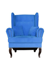 Blue soft chair with pillows on wooden legs. Upholstered furniture for the living room. Royal blue armchair isolated