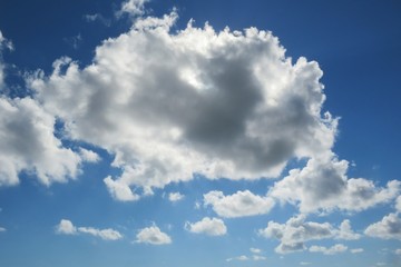 Naklejka na ściany i meble Beautiful cloudscape in blue sky, natural background