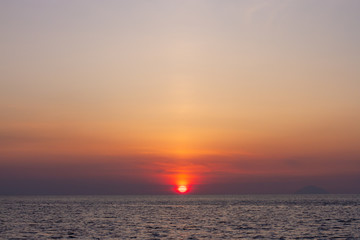 Sunset rise in the sea with abstract blur