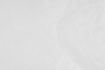 A white sheet of paper with slight bends.