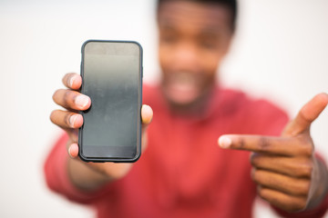 african man hands holding mobile phone and pointing to screen