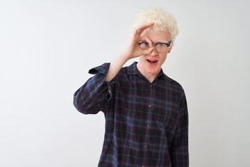 Young albino blond man wearing casual shirt and glasses over isolated white background doing ok...