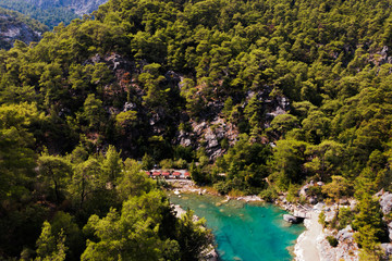 Amazing mountain landscape with winding road and coniferous forest. National nature park. Biosphere reserve. Ecological protection area. Trail in rocks woodland, trekking destination