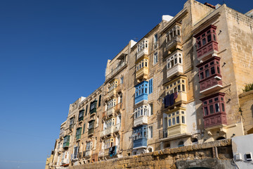 Fototapeta na wymiar Traditional Houses With Balconies In Valletta City