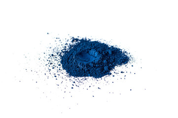Natural blue color matt pigment. Loose cosmetic powder. Eyeshadow pigment isolated on a white background, close-up