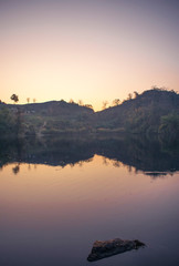 LAKE MOUNTAIN AND ORANGE SKY IN ASIA