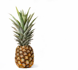 Fototapeta premium ripe pineapple on a white isolated background