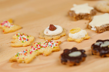 traditional homemade german christmas cookies on wooden board