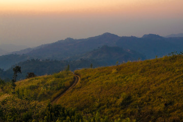Fototapeta premium ASAIN MOUNTAIN CALLED KEWKARADONG IN BANGLADESH WITH SUNSET