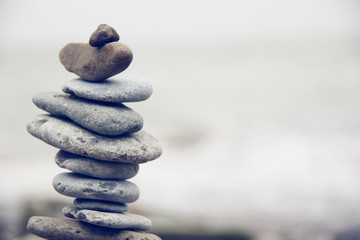 stack of pebbles on the beach closeup