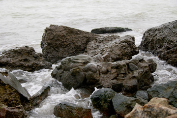 rocks and water splashes close up