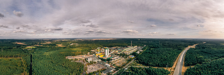 Aerial drone photography of an enormous sand pit construction site.