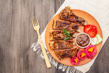 BBQ pork ribs with fermented, baked and fresh vegetables
